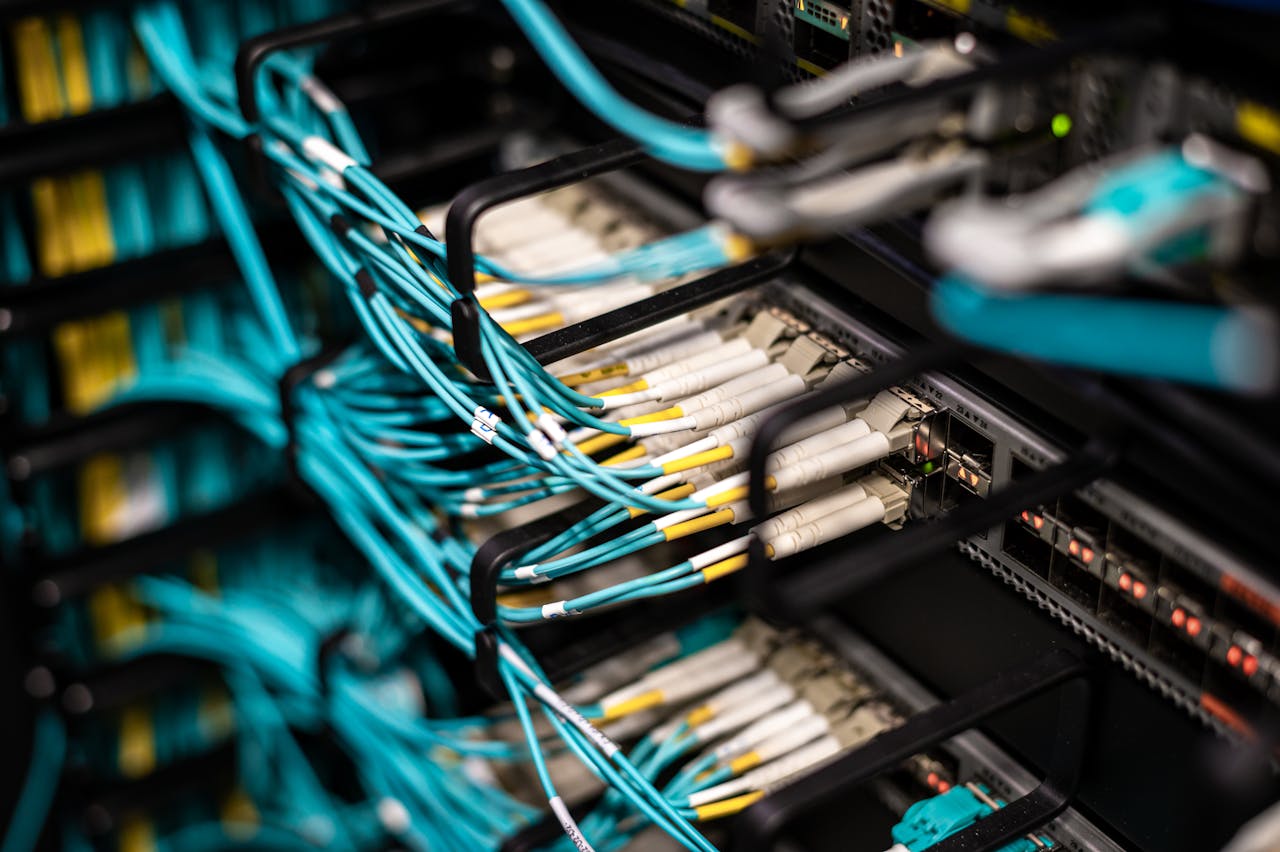portfolio-05 Numerous wires and cables mounted into server patch panel in modern data center